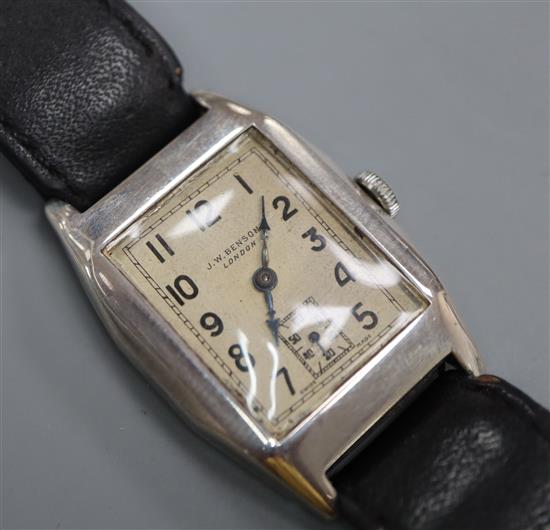 A gentlemans 1930s silver manual wind wrist watch, retailed by J.W. Benson, on leather strap in Benson box.